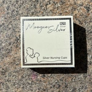 New silver nursing cups